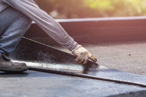 Professional Waterproofing technician working in Friendship, IN